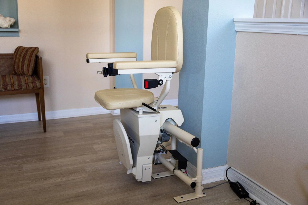 Helix curved stair lift folded in a bright living room