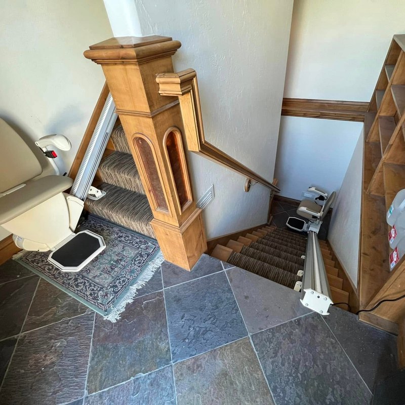 Two stair lifts in one home, on the entry flight and on the basement stairs