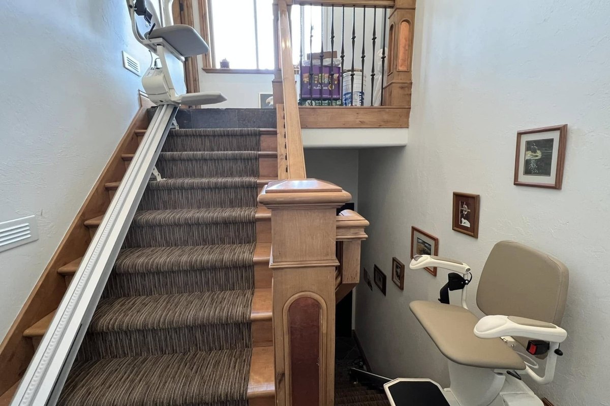 Split staircase with a Harmar SL600 stair lift on each flight